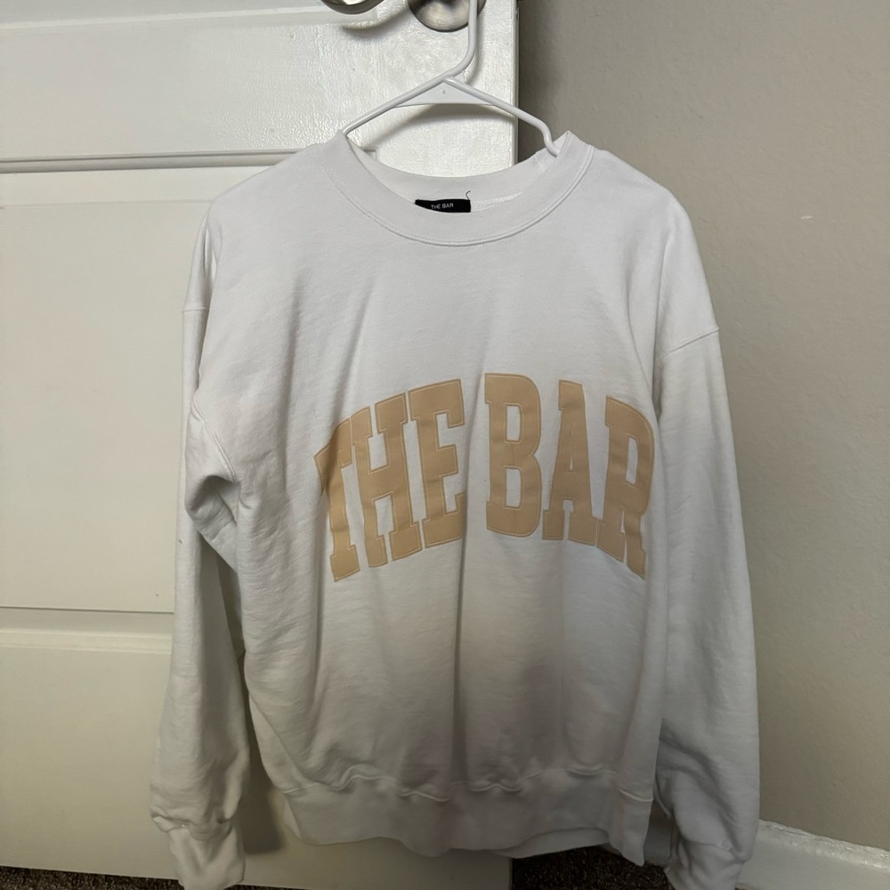 THE BAR Varsity sweatshirt in White with Tan Lettering